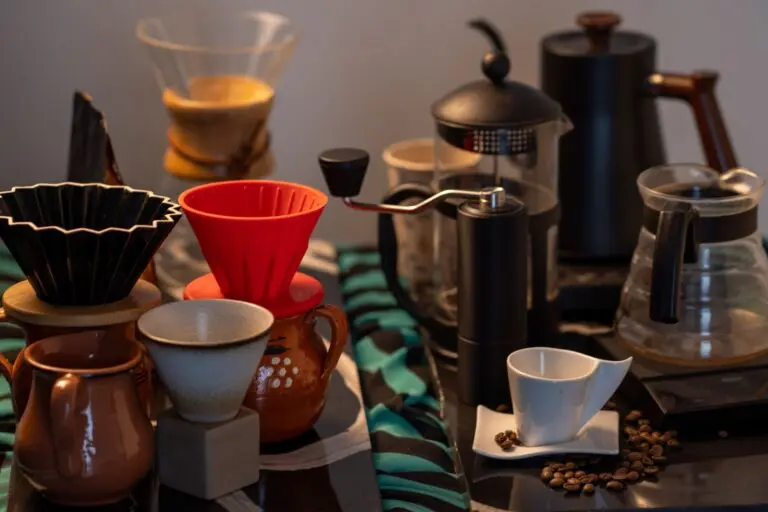 Explore an array of coffee brewing tools including drippers, grinders, and cups, ideal for crafting specialty coffee at home.